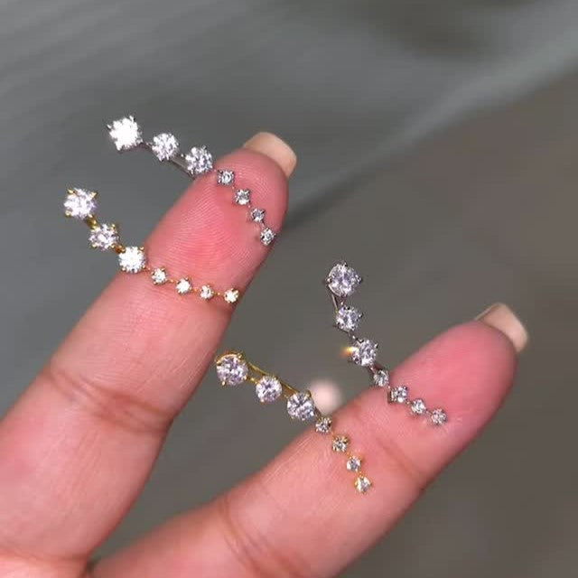 White rhodium plated silver Twinkle Ear Sliders
