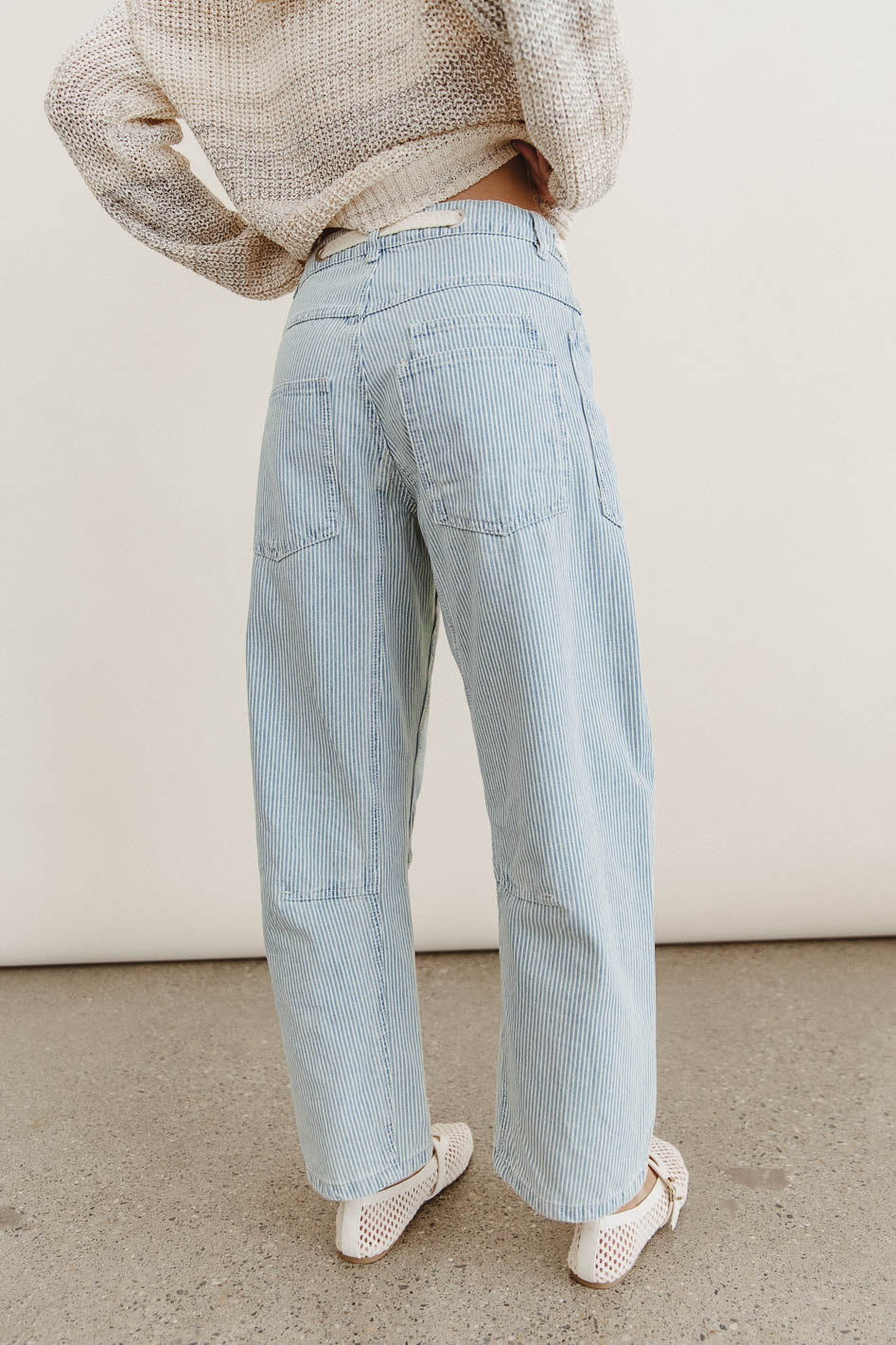 Light blue striped denim flared jeans